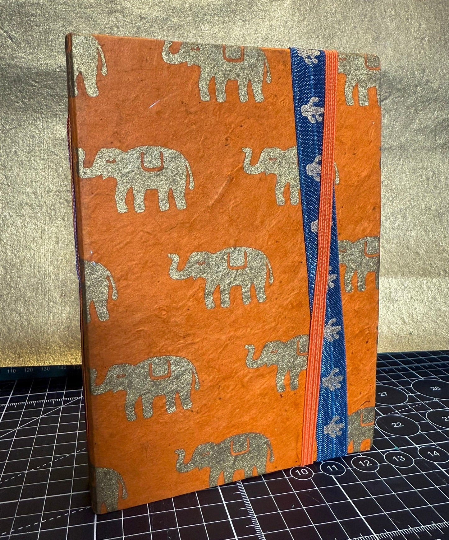 Gold Elephants on Orange