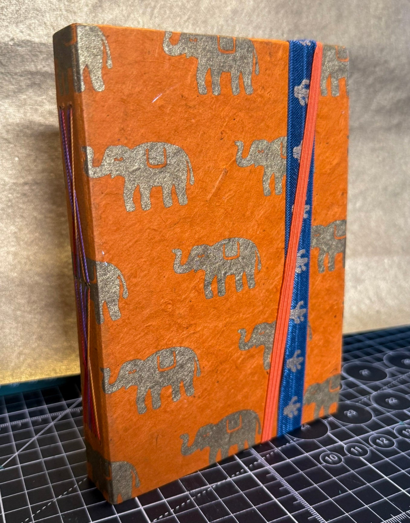 Gold Elephants on Orange